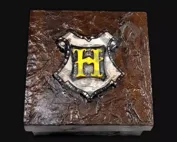 Caja cuadrada Hogwarts dorado